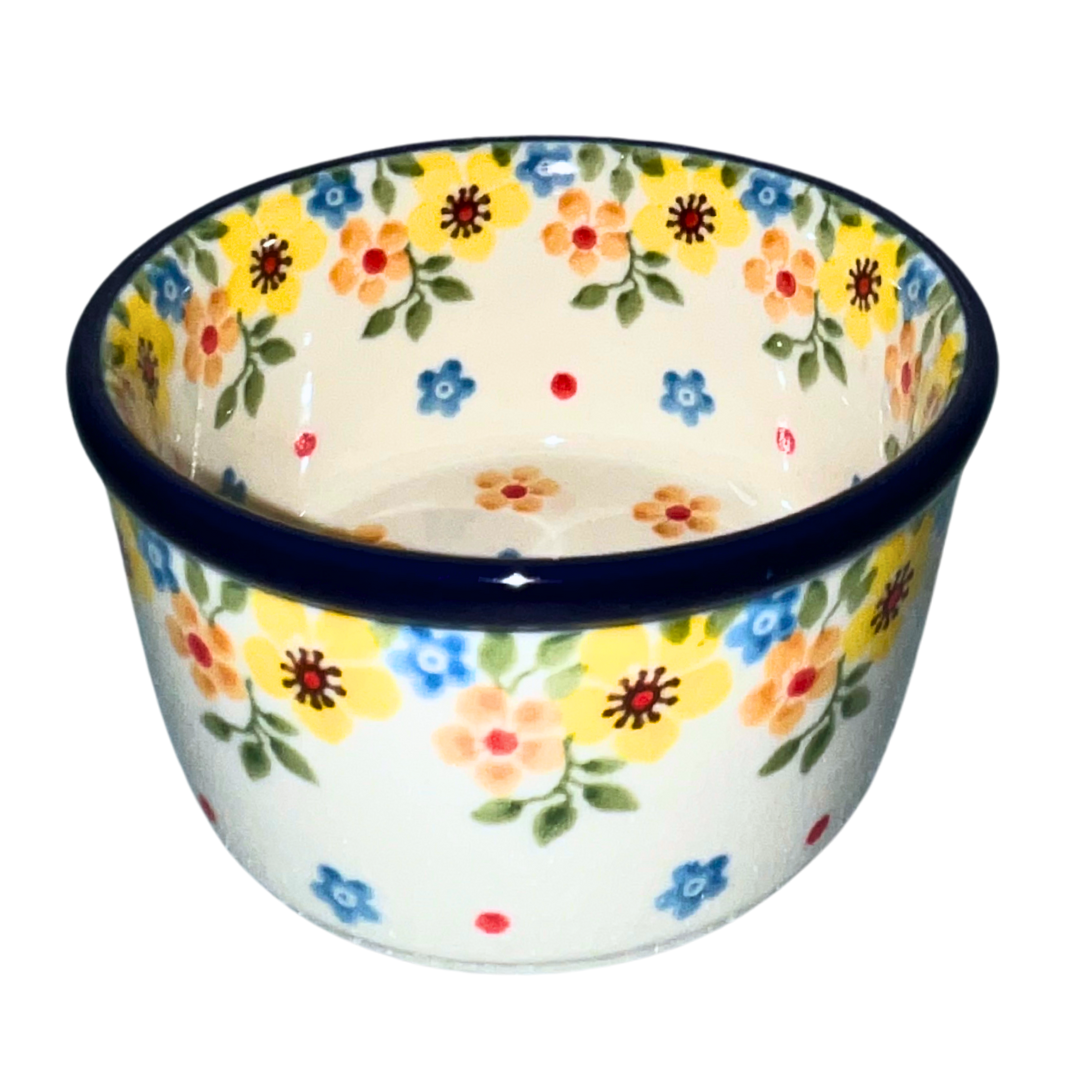 Handcrafted Polish Pottery 4 inch Ramekin in Ceramika Artystyczna Pattern 2225x Buttercup. A bright and cheery pattern with small yellow blue & orange flowers on white background
