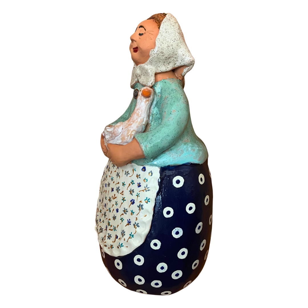 Hand-painted folk art babcia grannie figurine holding a duck