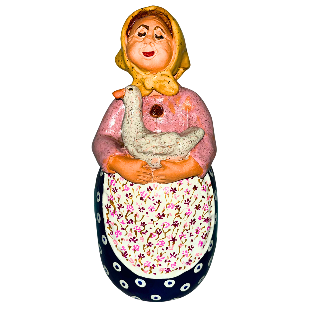 Hand-painted folk art babcia grannie figurine holding a duck