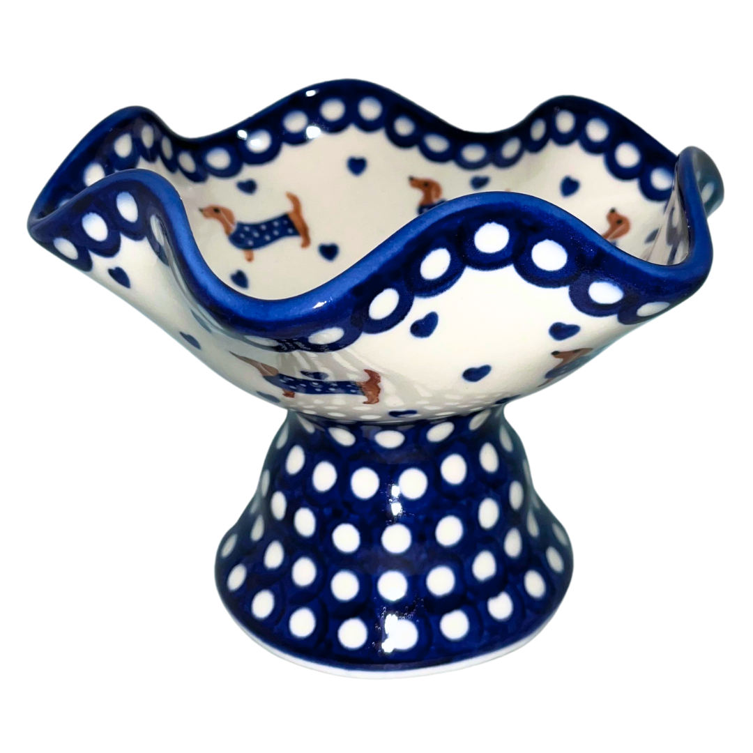 Ceramika Kalich Pattern 1322 Dachshunds features playful dachshunds in blue coats with scattered blue hearts and cobalt accents. Hand-painted Polish pottery from Poland.