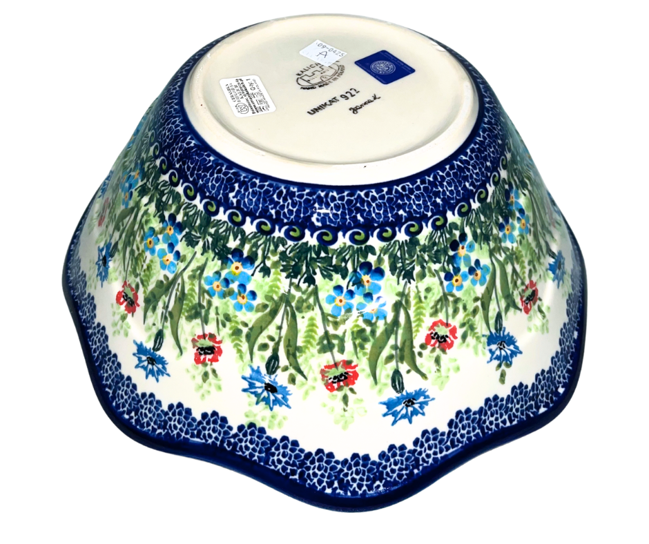 Hand-painted Kalich Polish pottery Viki bowl featuring wildflowers, poppies, and forget-me-nots with a scalloped rim. Durable stoneware, dishwasher, microwave, and oven safe.