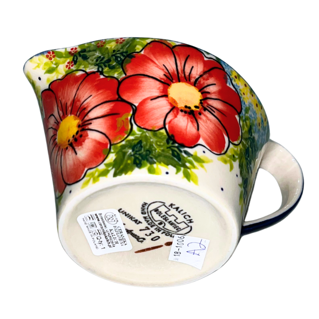 Kalich Polish Pottery Pattern 730 Red Poppy Garden, hand-painted red floral design with green foliage and cobalt accents, Bolesławiec stoneware, durable, dishwasher and microwave safe.