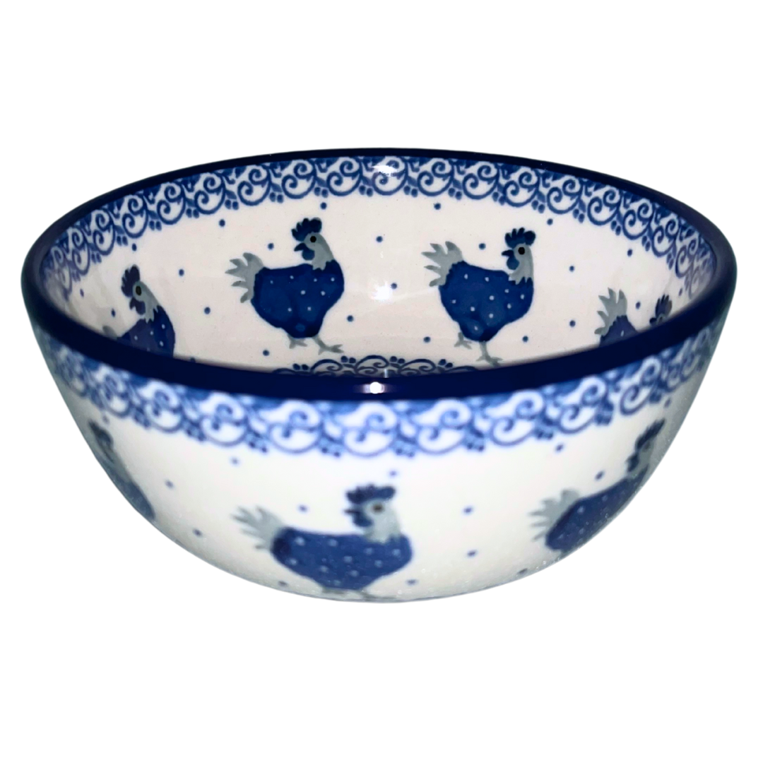 Handmade Polish pottery in Blue Hen pattern 2596X featuring charming cobalt hens and classic dot detailing. Durable, oven-safe stoneware from Bolesławiec.