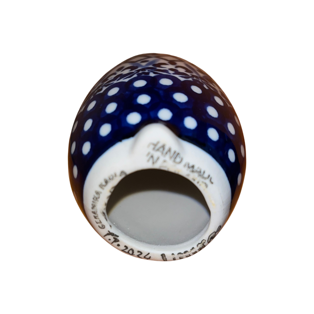 5.75" Polish pottery bunny by Kaola, hand-painted in cobalt lattice patterns, signed P P. Glossy, durable, collectible ceramic figurine.