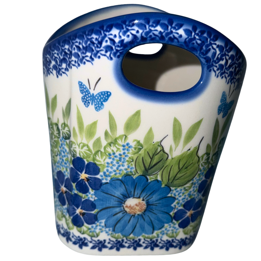 Ceramika Kalich Polish Pottery 37 oz Kubus pitcher with blue and white flowers, green foliage and butterflies, handcrafted in Bolesławiec, Poland.