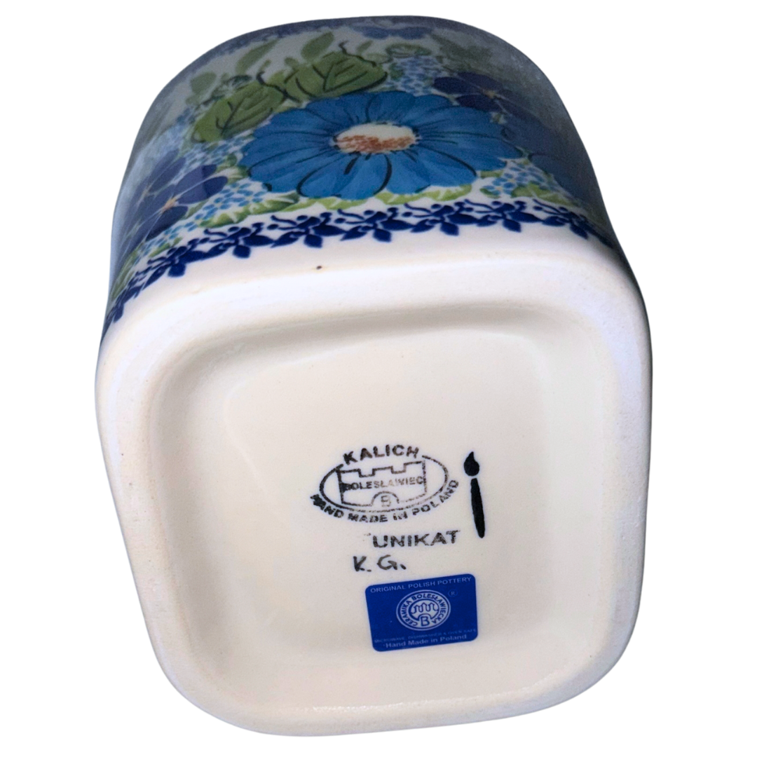 Ceramika Kalich Polish Pottery 37 oz Kubus pitcher with blue and white flowers, green foliage and butterflies, handcrafted in Bolesławiec, Poland.