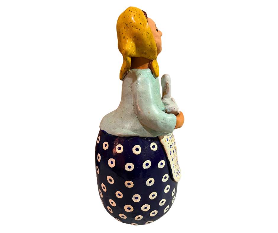 Hand-painted babcia grannie figurine holding a duck, wearing a pink scarf and floral apron