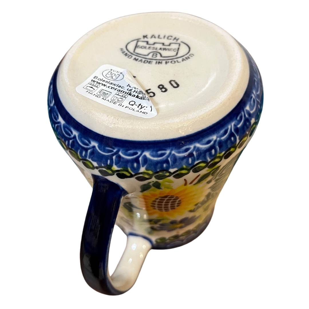 Ceramika Kalich Pattern 580 Sunflowers Polish pottery featuring bright sunflower and blue floral design. Authentic handcrafted Bolesławiec stoneware, durable, dishwasher, microwave, and oven safe.