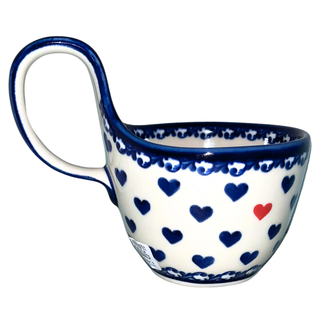 Ceramika Kalich Stars & Stripes features red, white and blue stars with patriotic heart motifs and cobalt accents. Hand-painted Polish pottery handcrafted in Poland.