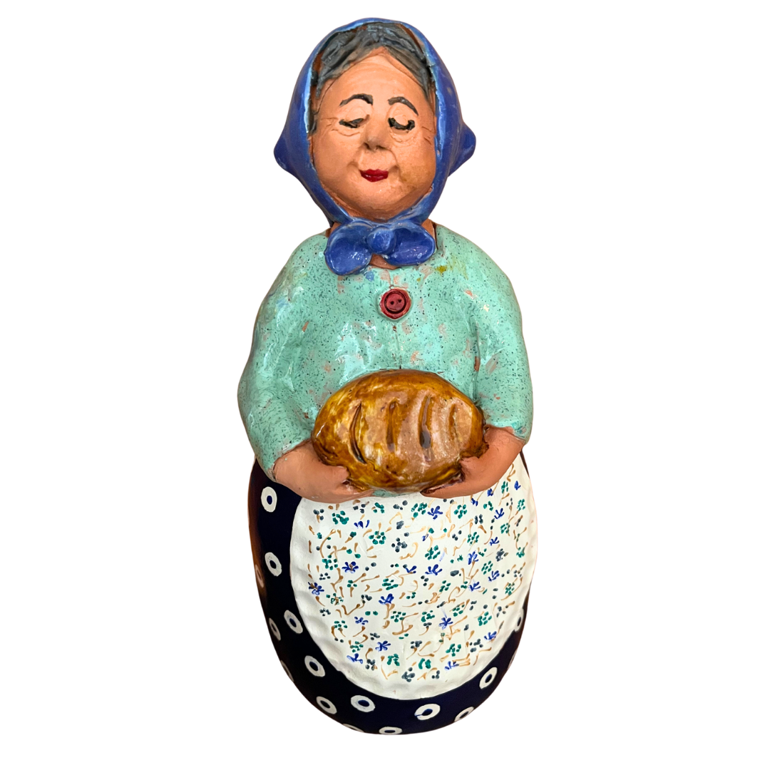 Hand-painted Polish folk art babcia grannie figurine holding a loaf of bread