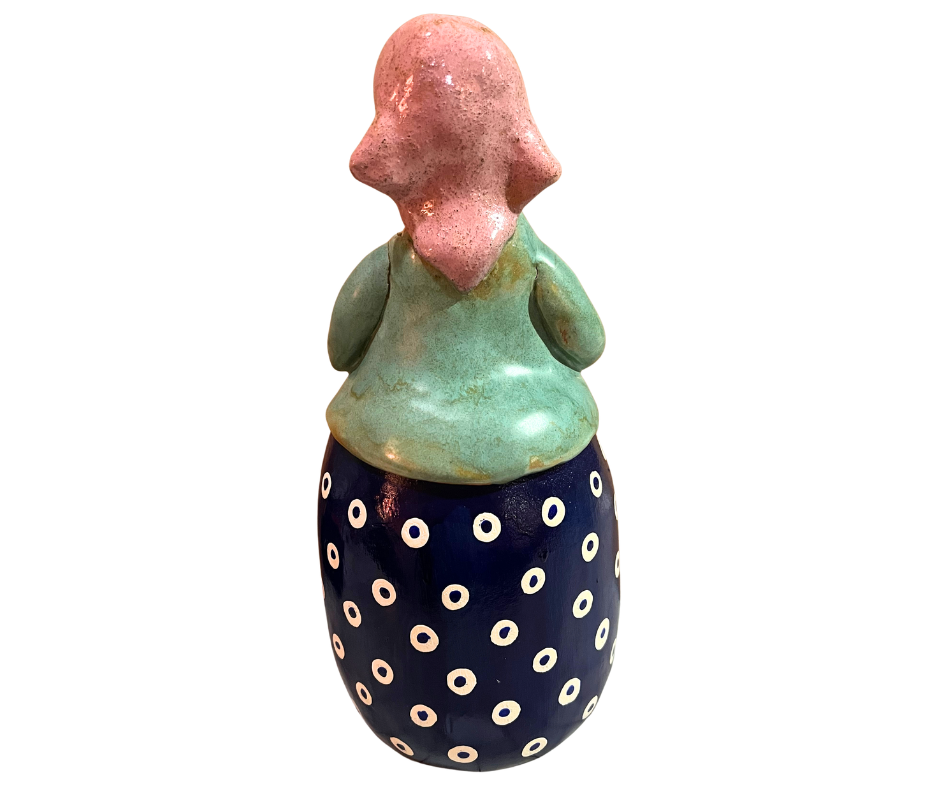 Hand-painted babcia grannie figurine holding a duck, wearing a pink scarf and floral apron