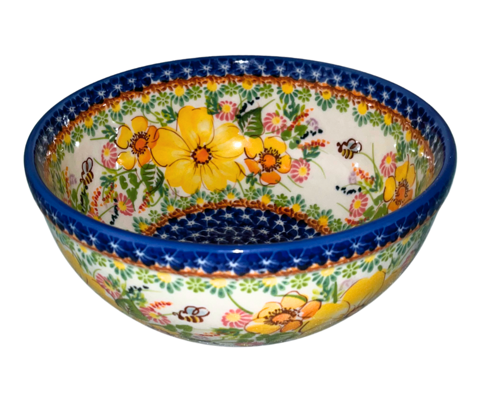 Kalich Polish Pottery 816 Golden Blossom Bee with yellow-apricot flowers, bee accents, and green foliage, framed by cobalt rim and detailed borders; hand-painted warm floral garden design.