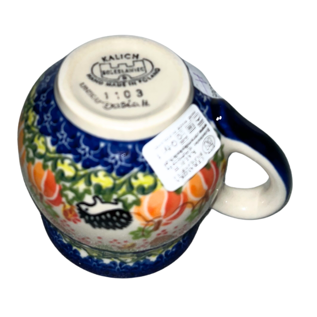 Kalich Polish Pottery Hedgehog Pumpkins Acorns pattern 1103 features hand-painted hedgehogs, pumpkins, and acorns in a vibrant autumn design on durable stoneware.