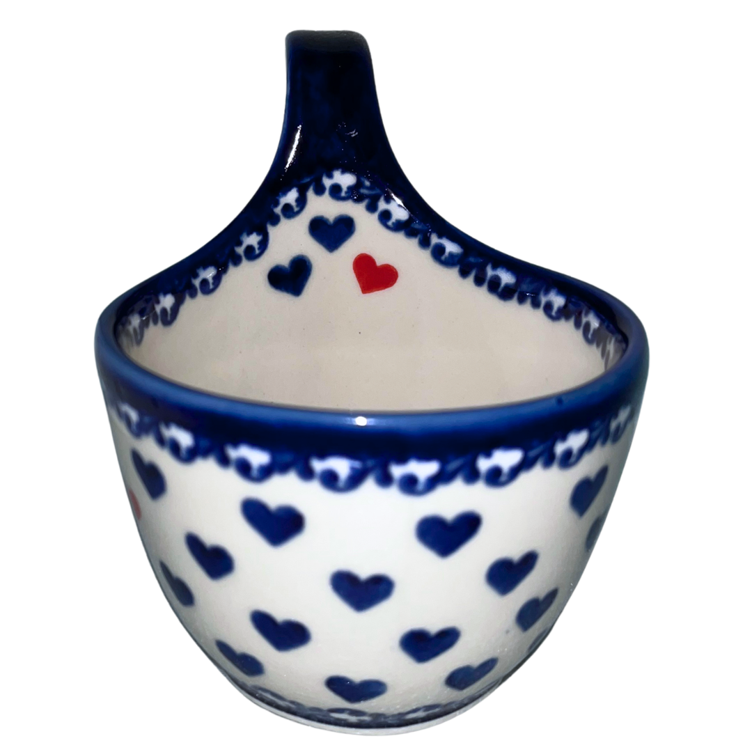 Ceramika Kalich Stars & Stripes features red, white and blue stars with patriotic heart motifs and cobalt accents. Hand-painted Polish pottery handcrafted in Poland.