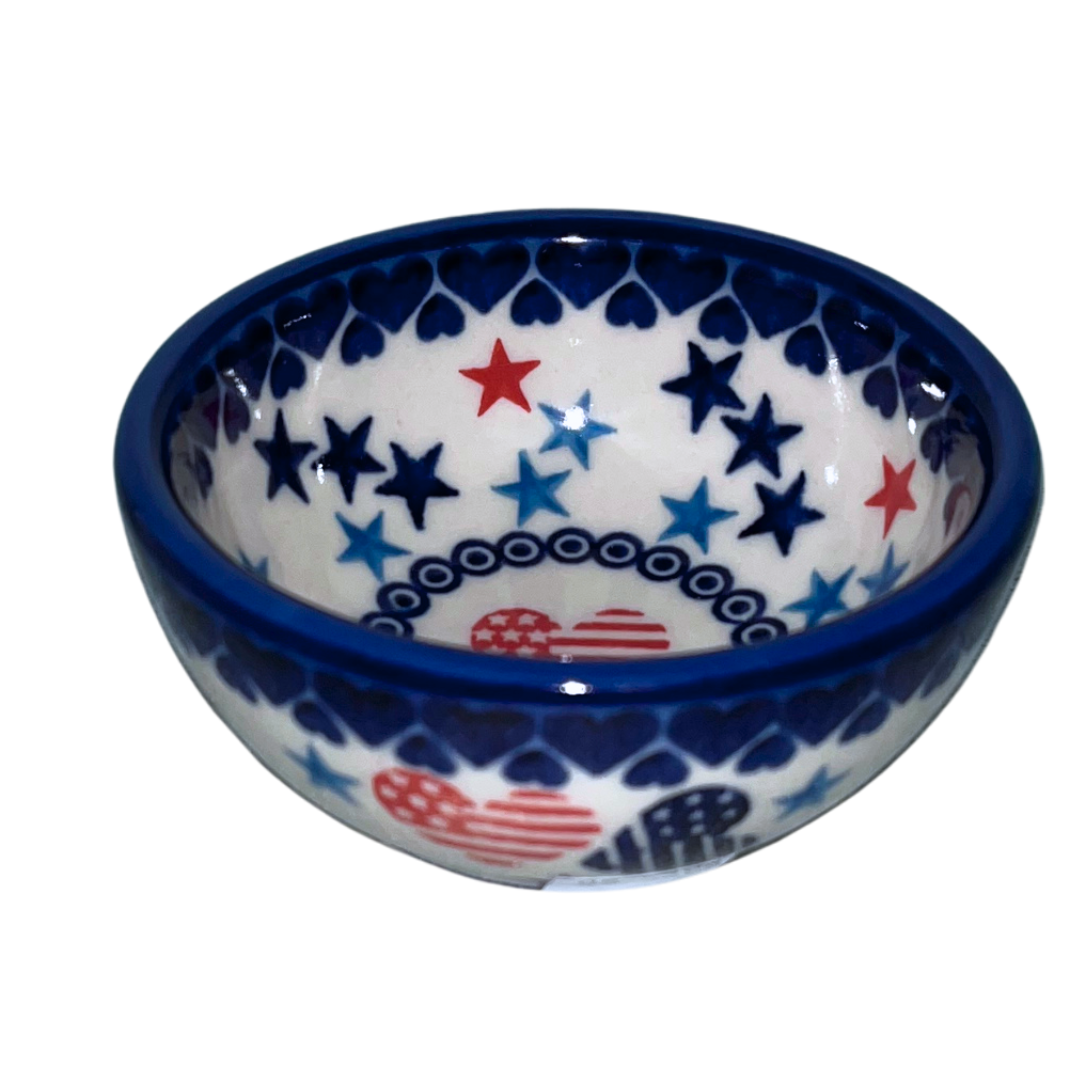Ceramika Kalich Stars & Stripes features red, white and blue stars with patriotic heart motifs and cobalt accents. Hand-painted Polish pottery handcrafted in Poland.