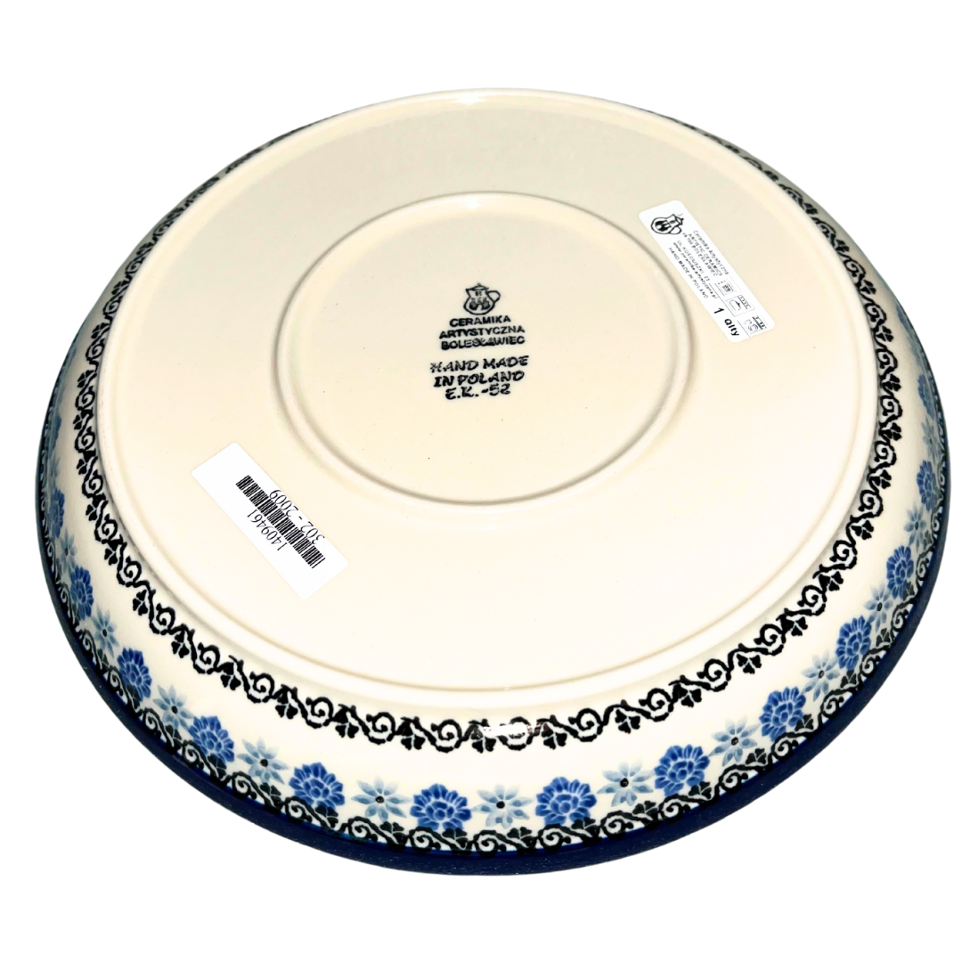 Ceramika Artystyczna 2009X Dragonfly features a blue dragonfly with delicate floral accents and intricate cobalt borders on cream; hand-painted airy blue-and-white design.