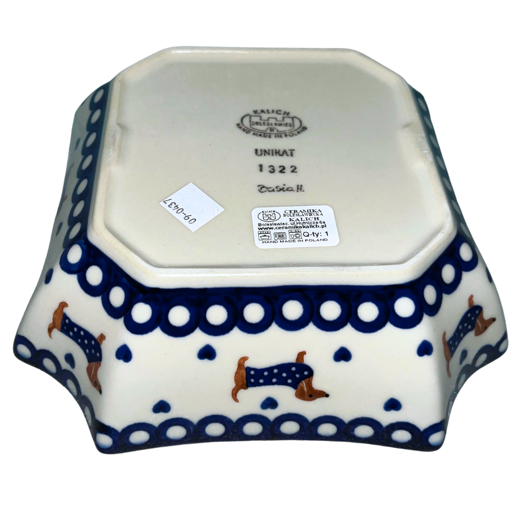 Ceramika Kalich Pattern 1322 Dachshunds features playful dachshunds in blue coats with scattered blue hearts and cobalt accents. Hand-painted Polish pottery from Poland.