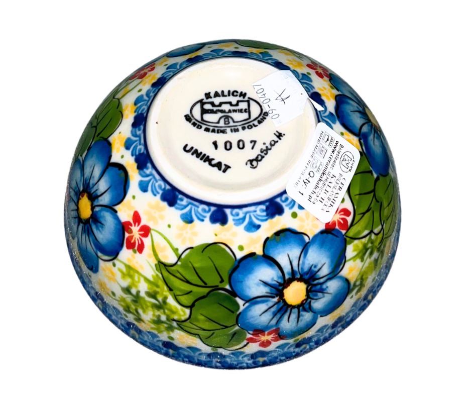 Kalich Polish Pottery 1007 Beautiful Blue floral pattern, hand-painted Bolesławiec stoneware bowl with cobalt rim, blue flowers, green leaves, and red accents, UNIKAT quality.