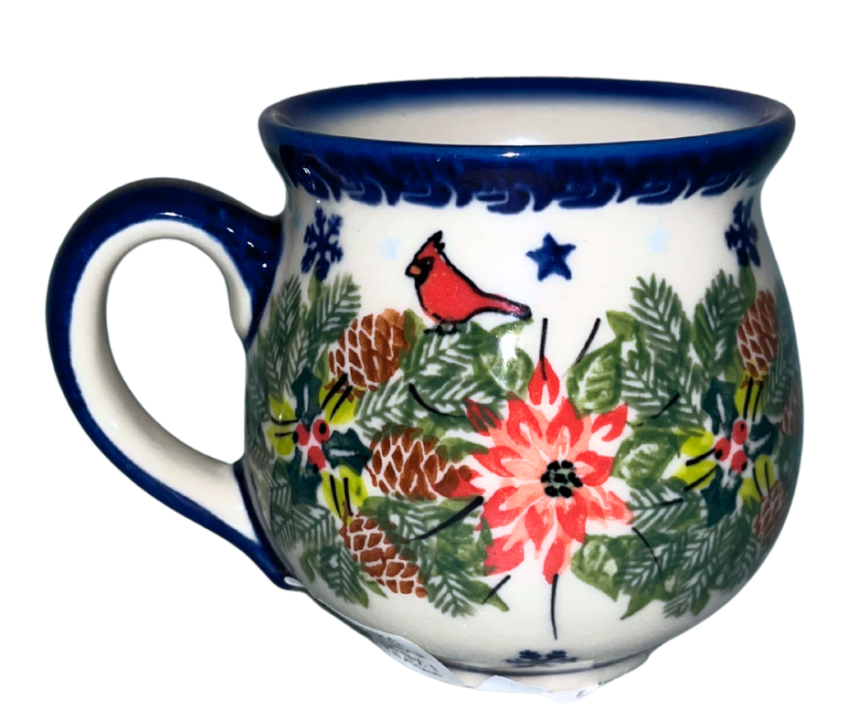 Kalich Polish Pottery 10oz Bubble Mug Unikat 710. Winter cardinal design with poinsettias, pinecones, & snowflakes. Handmade in Poland. Oven dishwasher microwave safe.