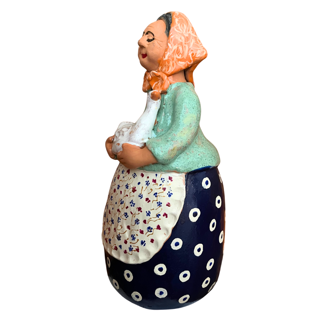 Hand-painted folk art babcia grannie figurine holding a duck