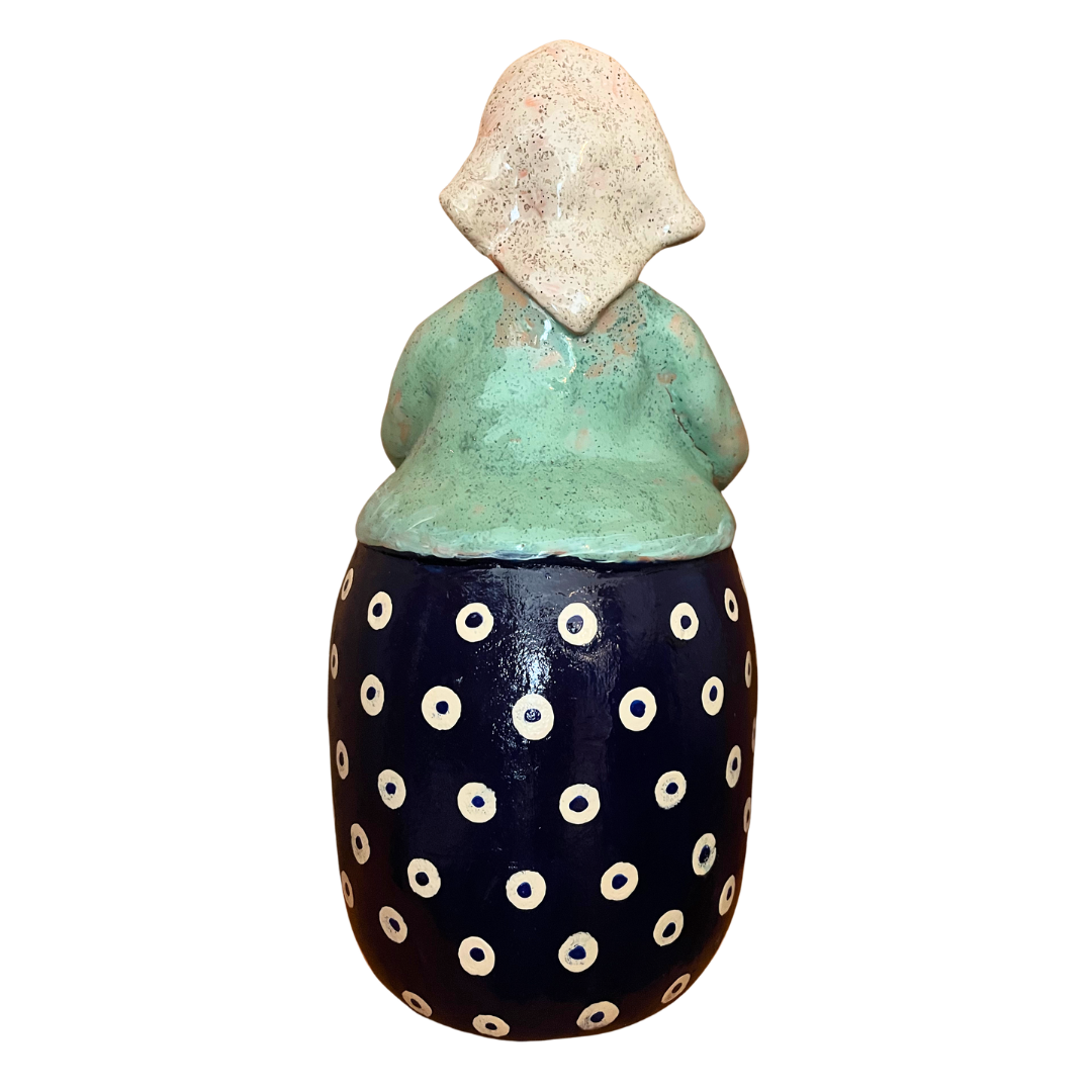 Hand-painted folk art babcia grannie figurine holding a duck