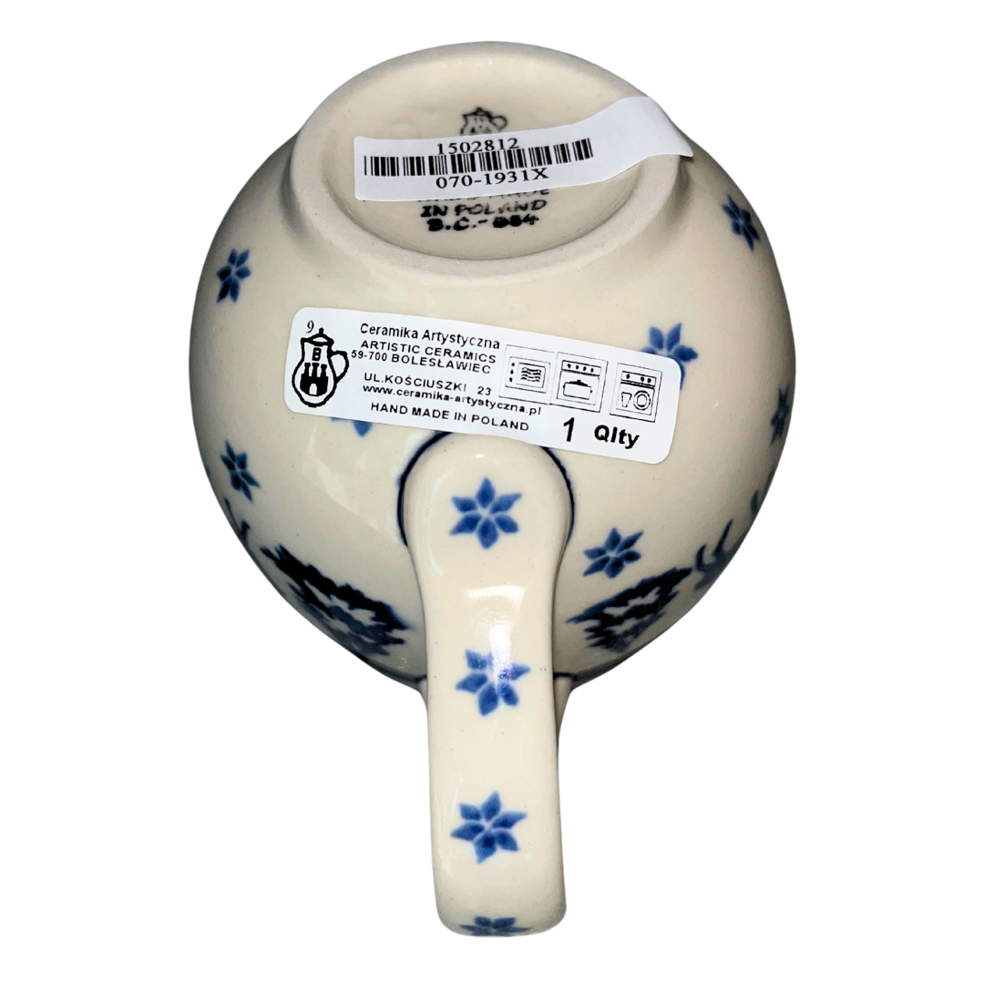 Ceramika Artystyczna Polish pottery Pattern 1913x Snowy Pines with blue winter forest and snowflakes. Handmade, durable, and perfect for everyday or holiday use.