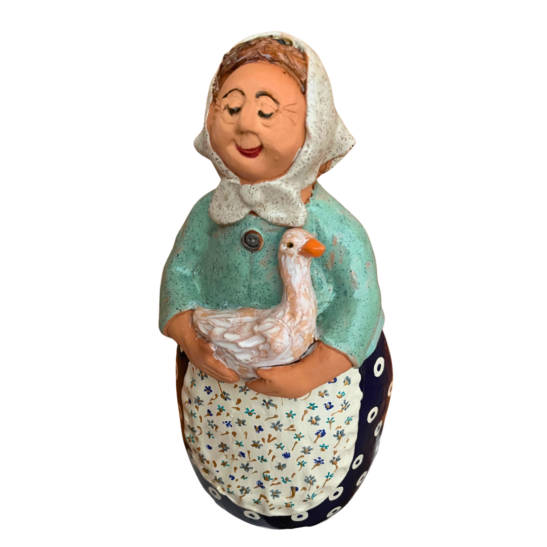 Hand-painted folk art babcia grannie figurine holding a duck