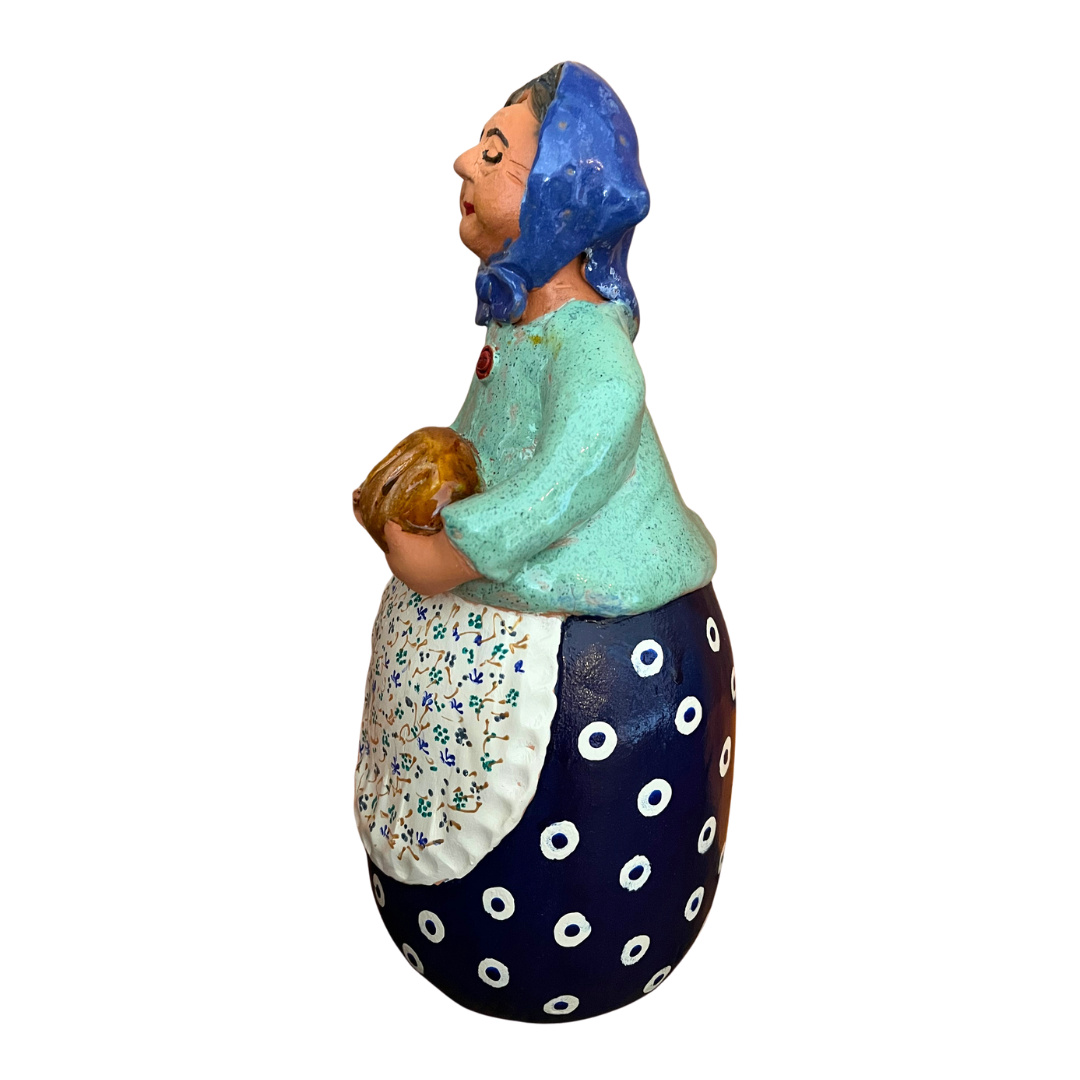 Hand-painted Polish folk art babcia grannie figurine holding a loaf of bread