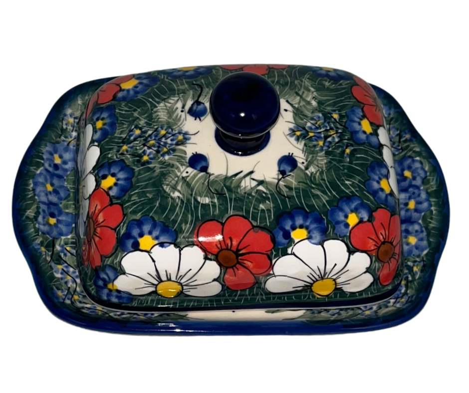 Kalich Polish Pottery 127/A Wildflowers Americana features red poppies, white daisies, and blue blooms on green with a cobalt rim; hand-painted floral design with Americana color palette.