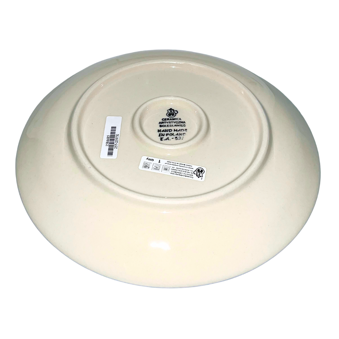 Handmade Polish pottery in Henny Penny pattern 2597X featuring charming blue hens and classic scrollwork. Durable, oven-safe stoneware from Bolesławiec.