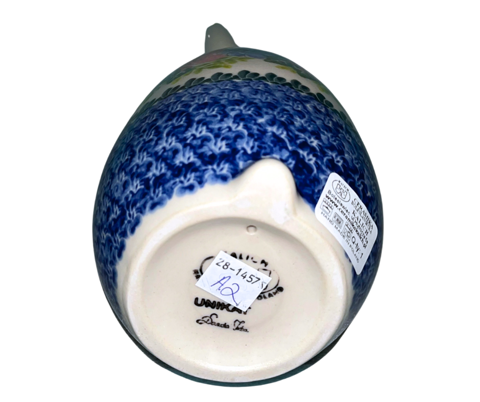 Handmade 12-inch Polish pottery bunny with blue bow tie by Ceramika Kalich. Hand-painted floral ceramic décor from Poland, perfect for Easter and spring displays.