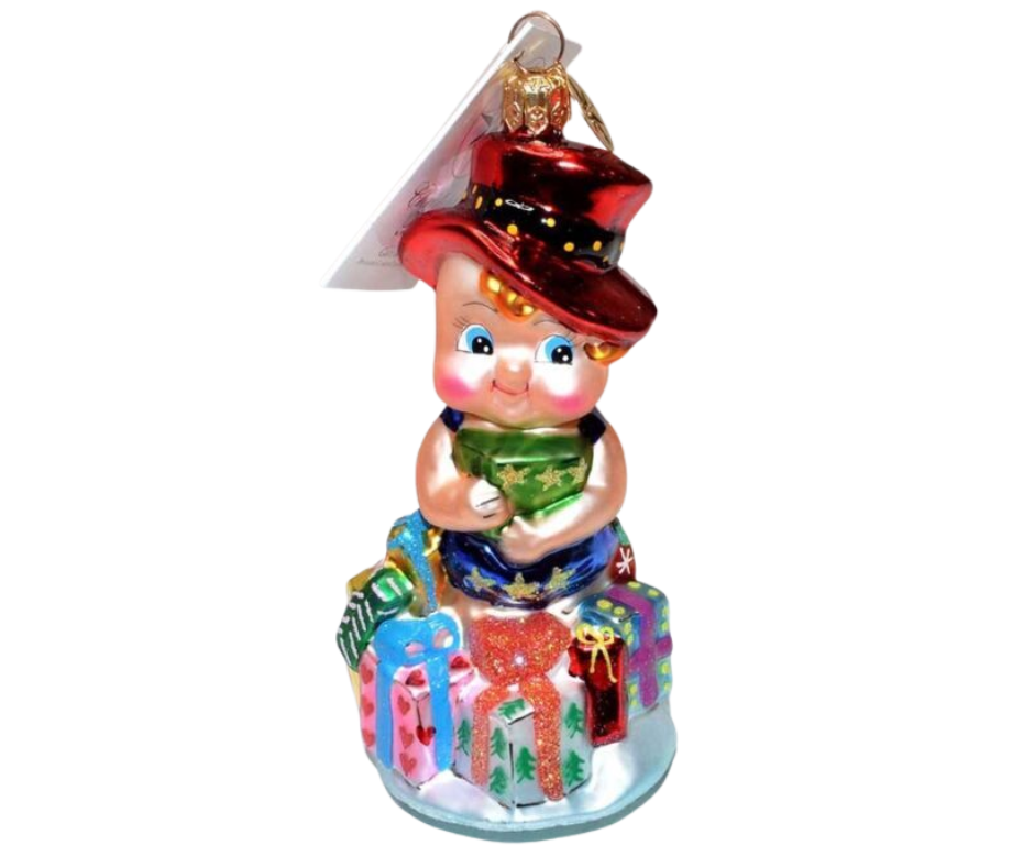 Christopher Radko “Gift of Health” #00-SP-73 hand-blown glass ornament featuring a child with gifts and red hat. Vintage collectible symbolizing care, wellness & holiday joy.