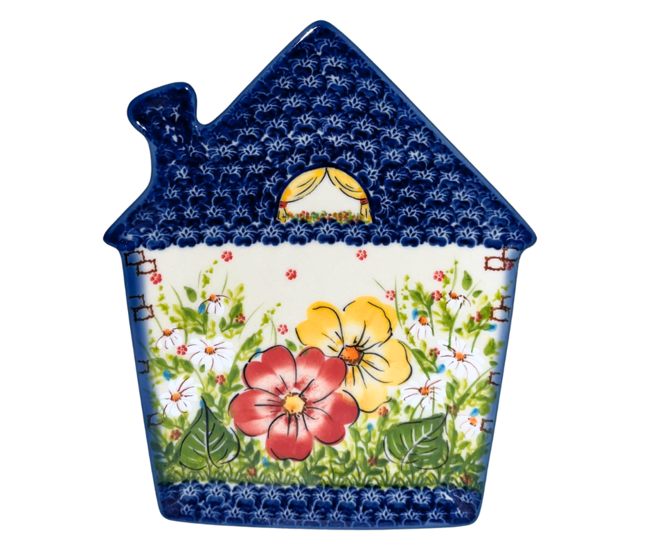 Ceramika Kalich hand-painted Polish pottery house plate featuring a cobalt blue roof and colorful floral garden design. Decorative cottage-shaped stoneware collectible.