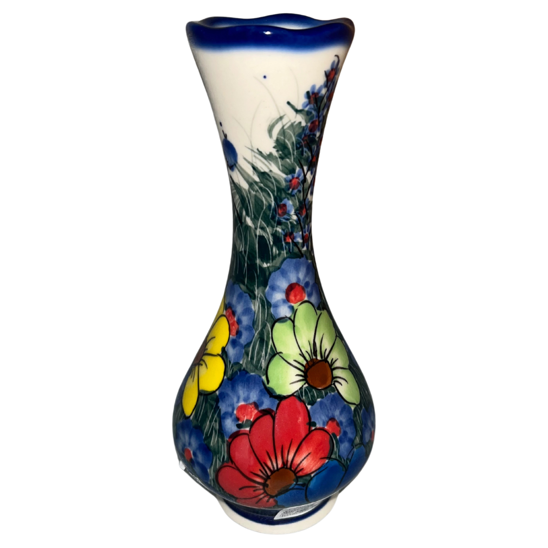 7 inch Swirl Vase Ceramika Kalich’s Pattern 127 “Wildflowers,” features blooming flowers in several color variations set against a cream and cobalt-blue background.