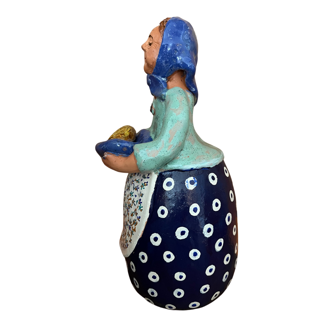 Hand-painted Polish folk art babcia grannie figurine holding a loaf of bread