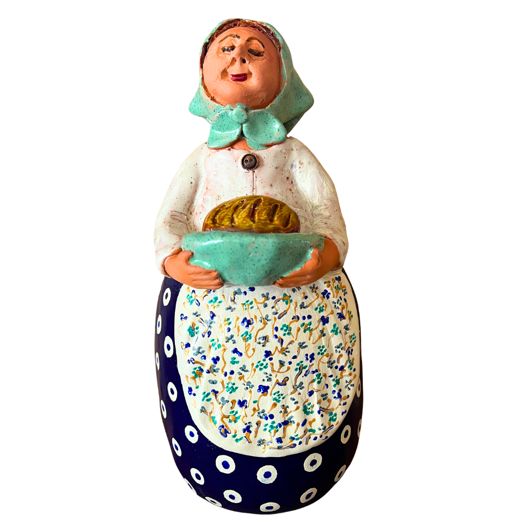 Hand-painted Polish folk art babcia grannie figurine holding a loaf of bread