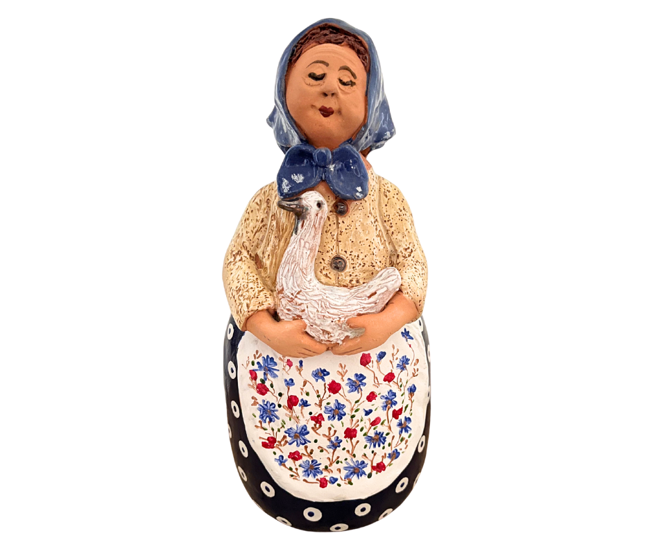 Hand-painted 12-inch Polish grandmother figurine holding a duck, wearing a traditional headscarf and floral apron. (Copy)