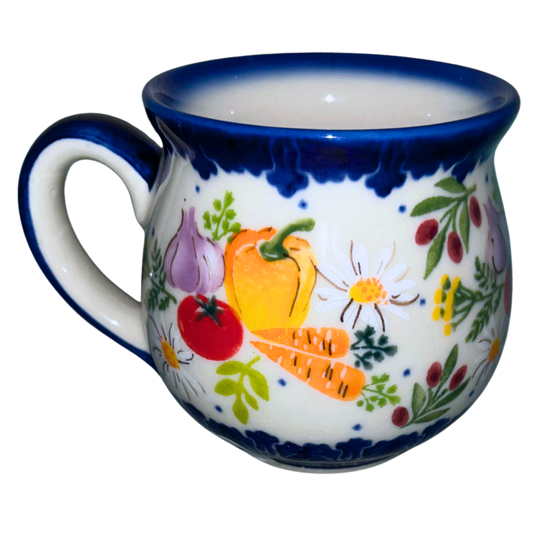 Ceramika Kalich 1142 Farmers Market pattern, hand-painted vegetable and floral Polish pottery with cobalt accents, cheerful Bolesławiec kitchen-inspired stoneware design.