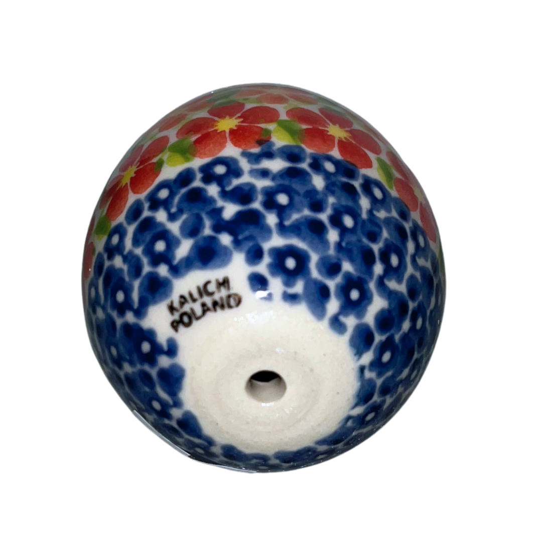 3" hand-painted Polish pottery egg with vibrant red, orange, and yellow floral design. A charming decorative accent perfect for Easter, gifts, or collectible displays.