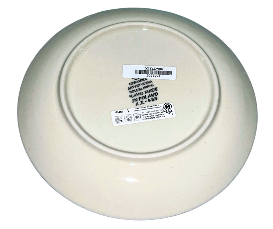 Ceramika Artystyczna Polish pottery pattern 2751X “Blue Orchids.” Hand-decorated Bolesławiec stoneware featuring blue orchid motifs, cobalt medallion center, and traditional stamped border design.