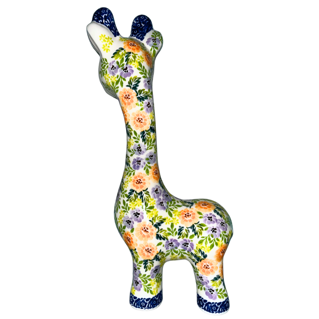 11" ceramic giraffe figurine with orange and lavender floral pattern and blue accents. Glossy finish decorative piece for home décor, nursery styling, or collectible display.