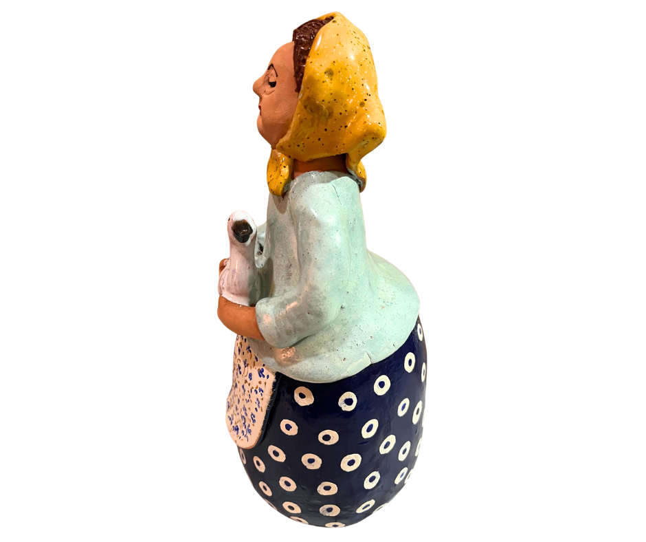 Hand-painted babcia grannie figurine holding a duck, wearing a pink scarf and floral apron