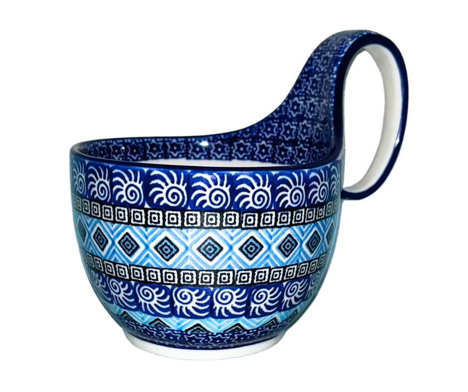 Ceramika Artystyczna 1917X Aztec Sky features geometric blue, white, and black bands with diamond and spiral motifs; hand-painted modern Polish pottery design with bold symmetry.