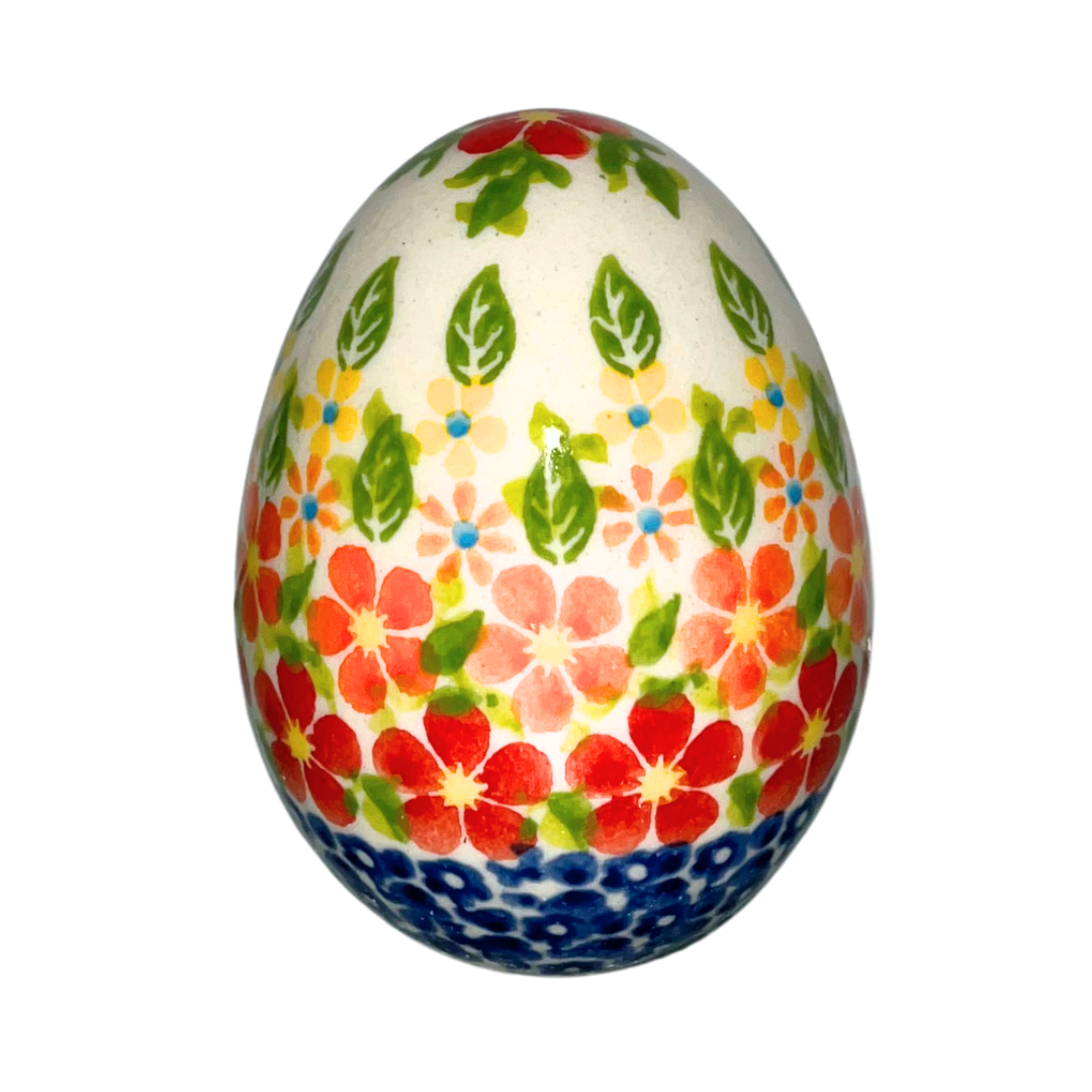 3" hand-painted Polish pottery egg with vibrant red, orange, and yellow floral design. A charming decorative accent perfect for Easter, gifts, or collectible displays.
