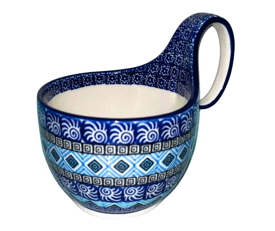 Ceramika Artystyczna 1917X Aztec Sky features geometric blue, white, and black bands with diamond and spiral motifs; hand-painted modern Polish pottery design with bold symmetry.