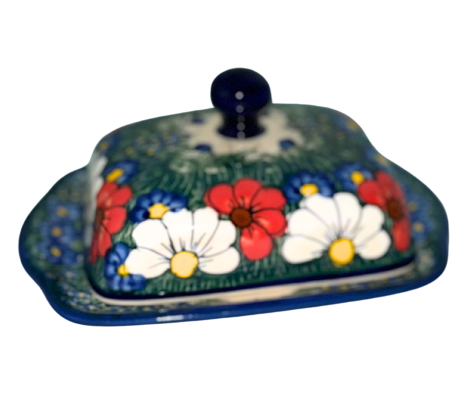 Kalich Polish Pottery 127/A Wildflowers Americana features red poppies, white daisies, and blue blooms on green with a cobalt rim; hand-painted floral design with Americana color palette.