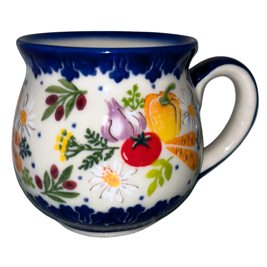 Ceramika Kalich 1142 Farmers Market pattern, hand-painted vegetable and floral Polish pottery with cobalt accents, cheerful Bolesławiec kitchen-inspired stoneware design.