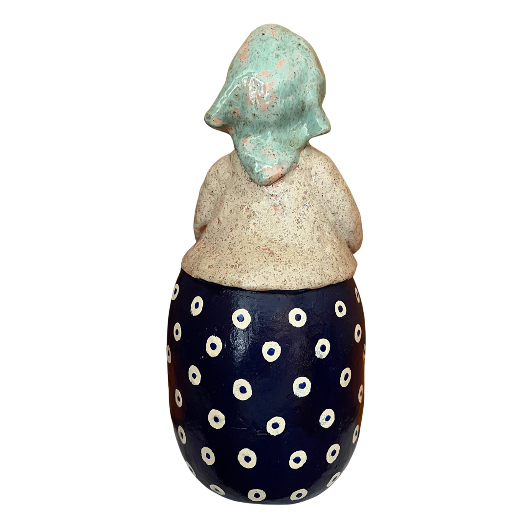 Hand-painted Polish folk art babcia grannie figurine holding a loaf of bread