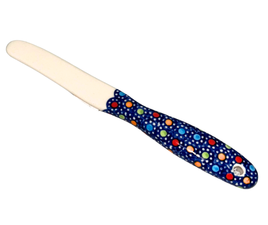 Kalich Polish Pottery knife spreader in Pattern 400 Polka Dots. Hand-painted in Poland with cheerful multicolor dots on cobalt blue. Durable, food-safe, and dishwasher safe.