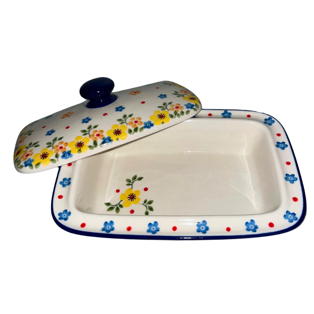 Hand-painted Polish pottery in Buttercup (2225X) features bright yellow florals and classic craftsmanship. Durable, dishwasher-safe, and made in Poland.